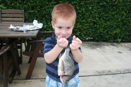 Alex’s first fish aged 4 © Jeni Bone